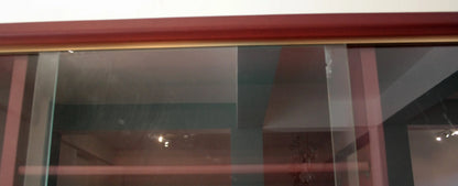 Sliding glass door with wood trim in similpelle bordeaux credenza by Umberto Mascagni negli anni 50 design italiano d’epoca