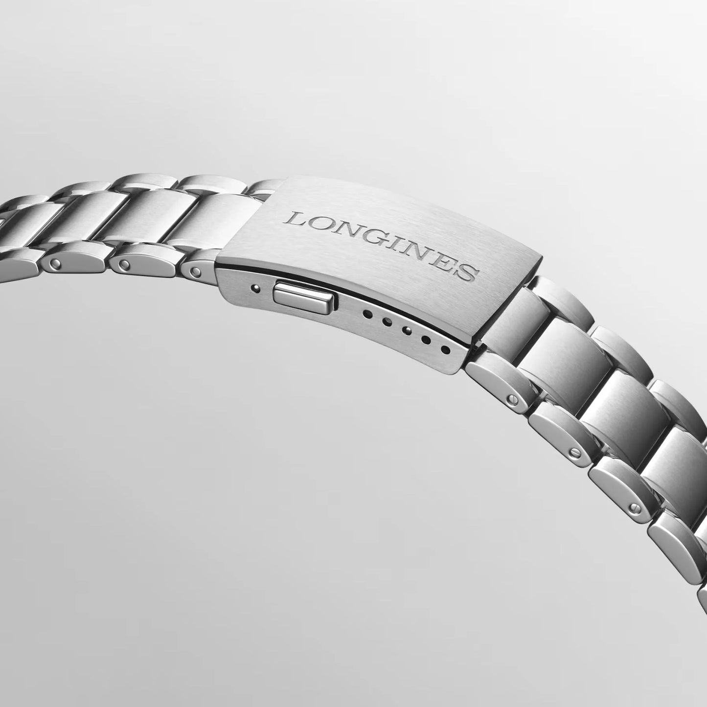 Bracciale in acciaio inox tono argento con design a maglie interbloccate e logo Longines per spirit zulu time