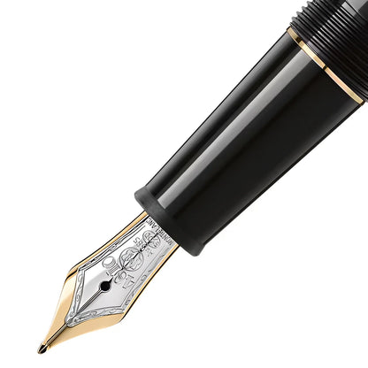 Elegante stilografica meisterstück montblanc nera con finitura oro e incisioni argento su corpo lucido
